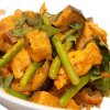 VARKENSHAAS IN MILDE CURRYSAUS