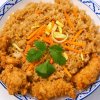 Nasi met in paneermeel gebakken kip