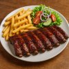 Spareribs (middel) met patat en salade
