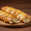 Stokbrood met kruidenboter, ham en kaas